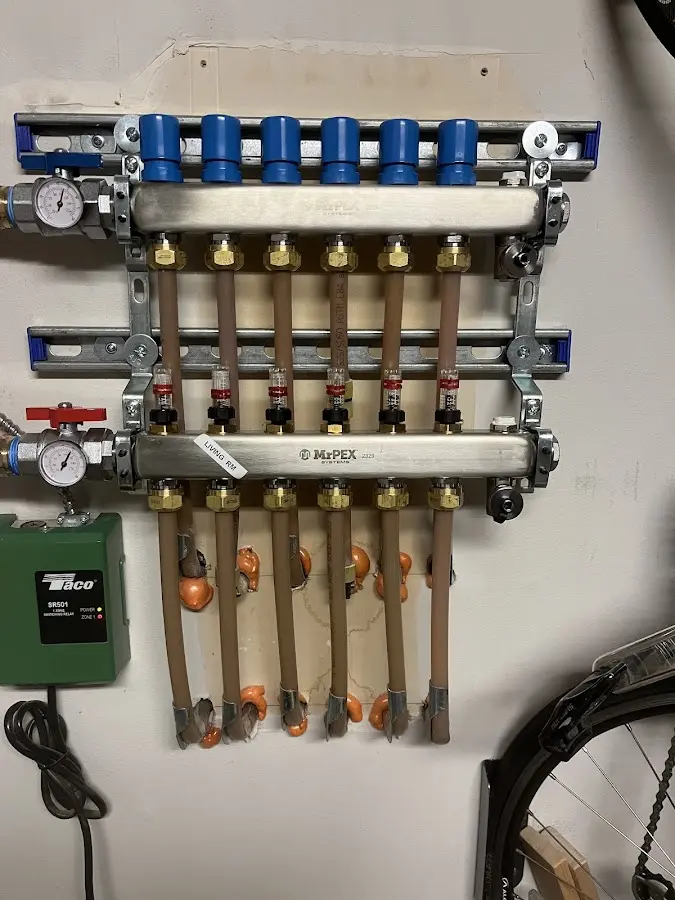 Plumber performing Water Heater Repair at a residential property in Corning